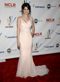 http://img254.imagevenue.com/loc566/th_81628_Selena_Gomez_arrives_at_the_ALMA_Awards3_122_566lo.jpg